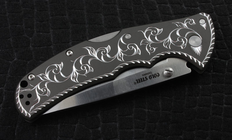 NRA hand engraved Code 4